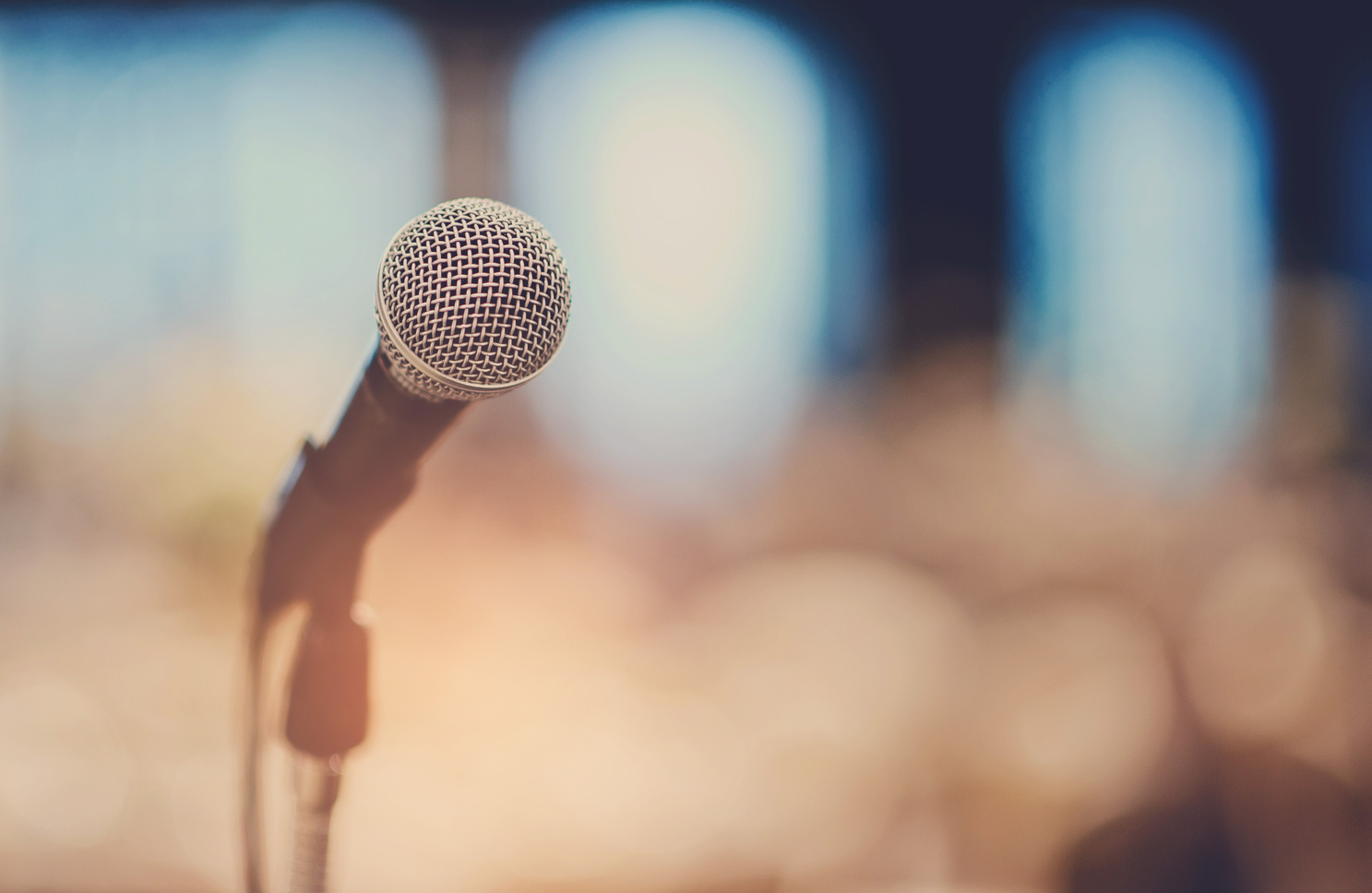 microphone on stage, speaker, conference